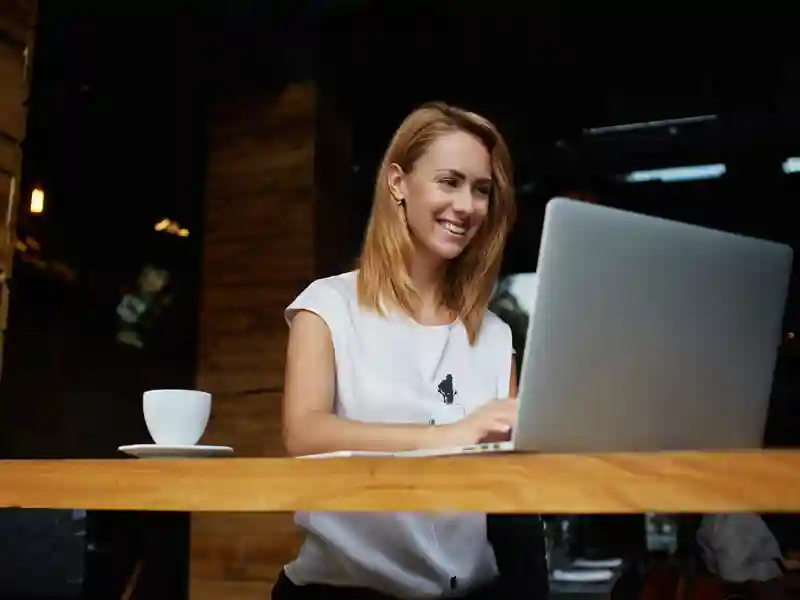 Woman looking at laptop